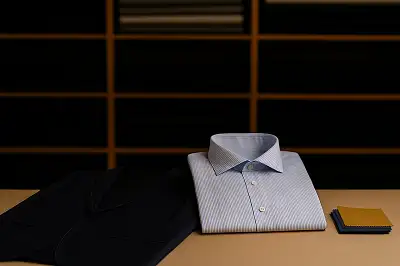 Jacksonville FL tailor working on a custom suit at Myra Tailors