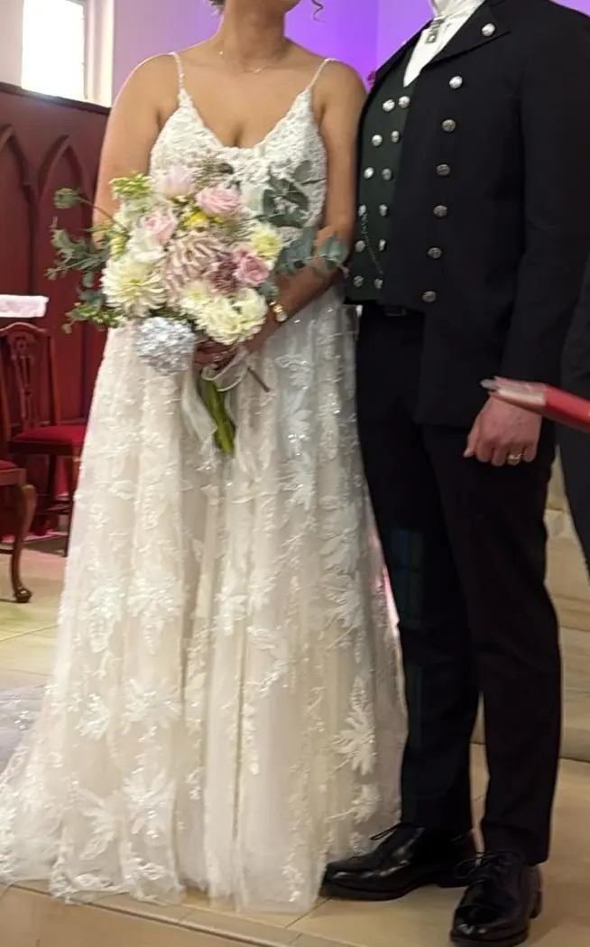 Thomas L wearing a Norwegian-inspired wedding suit made by Myra Tailors in Hong Kong